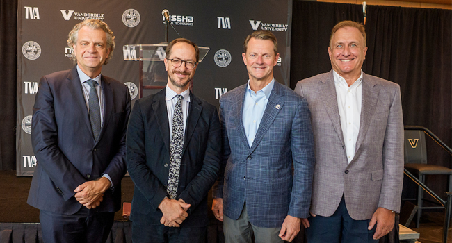 Daniel Diermeier, Freddie O'Connell, Stuart McWhorter and Sam Heleba pose for a group photo at a press conference