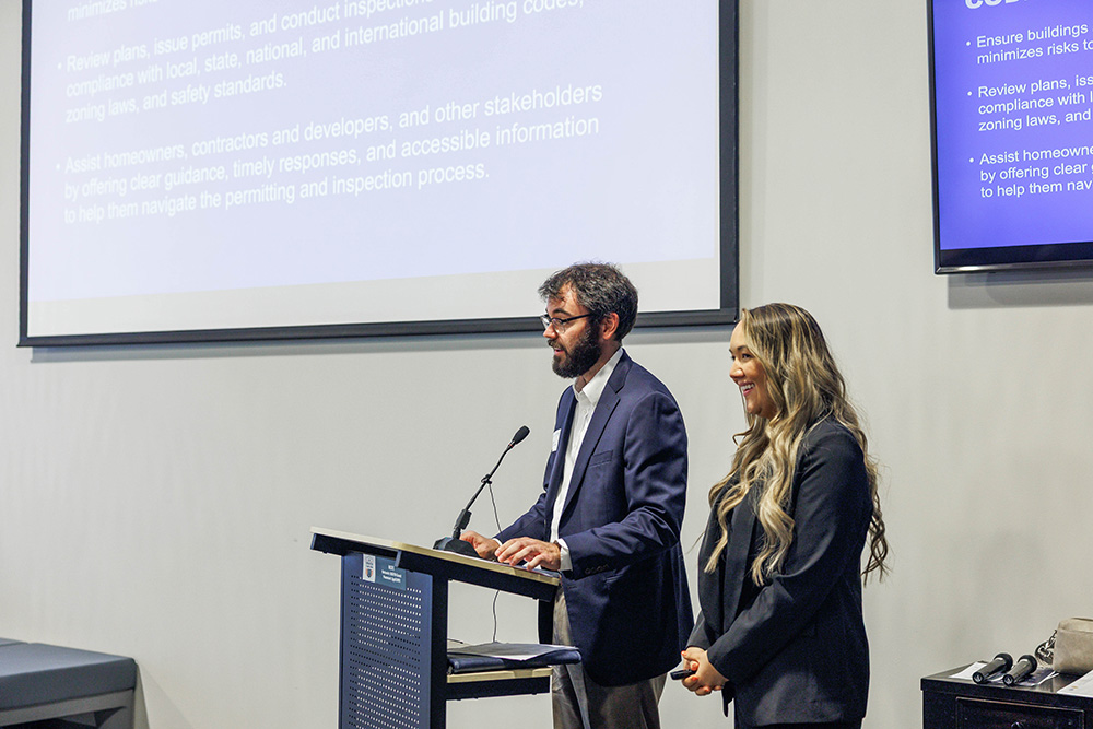 Metro Government representatives present a civic challenge during the inaugural Civic Tech Jam, inviting researchers to develop technology-based solutions.