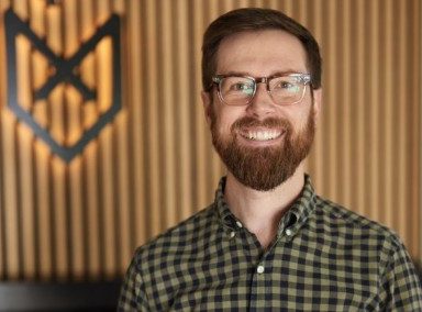 Colton Mulligan, co-founder and CEO of FoxFuel Creative, poses for a portrait.
