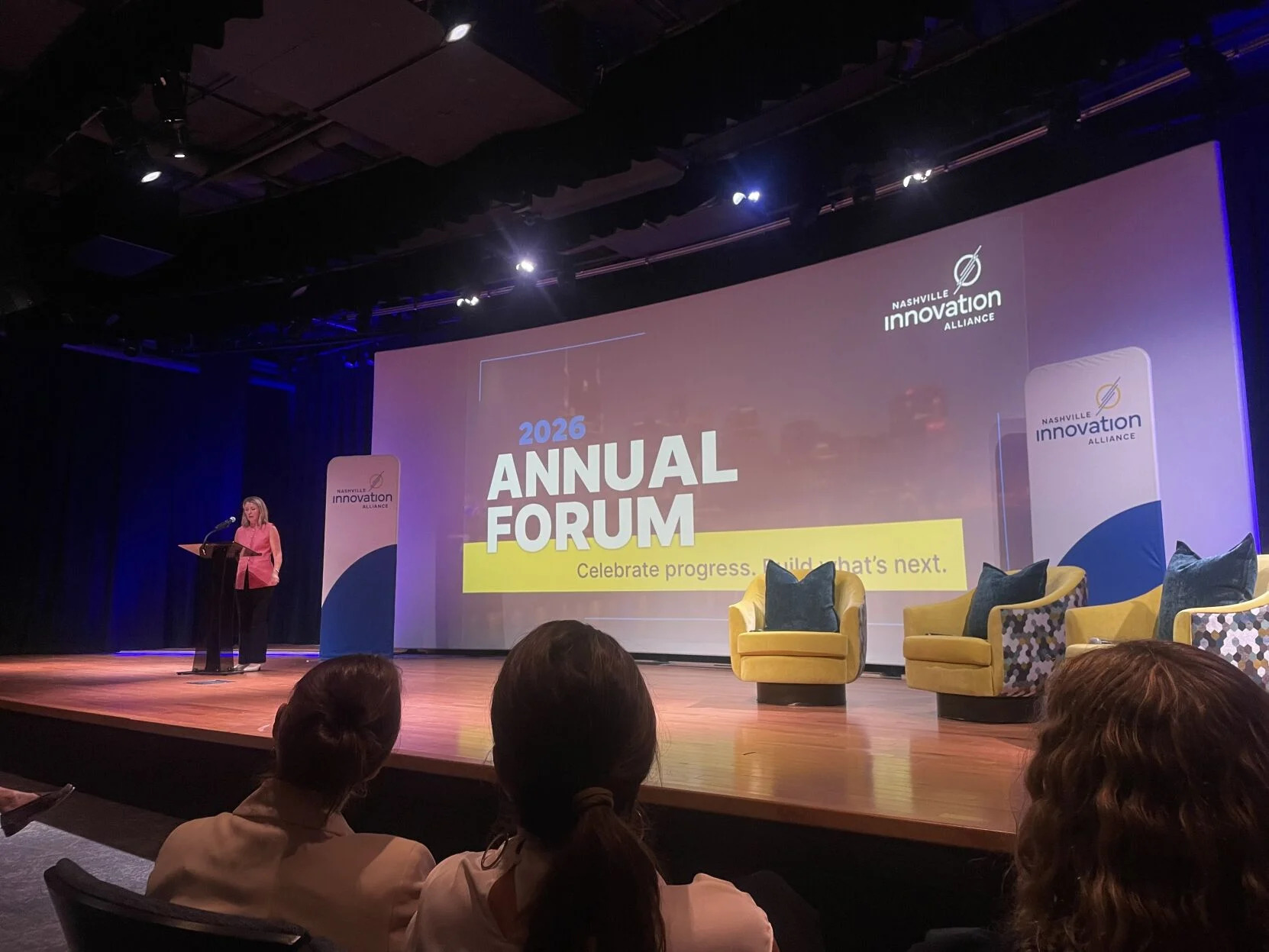 Sally Parker speaks at the podium during the Nashville Innovation Alliance 2026 Annual Forum.